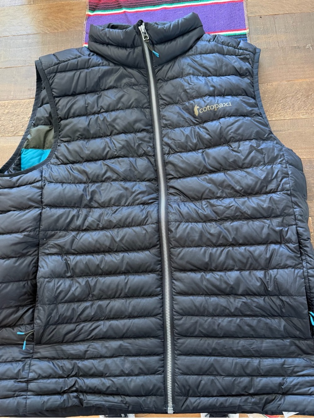 cotopaxi Black Puffer Vest with Yellow Logo Detail men’s large